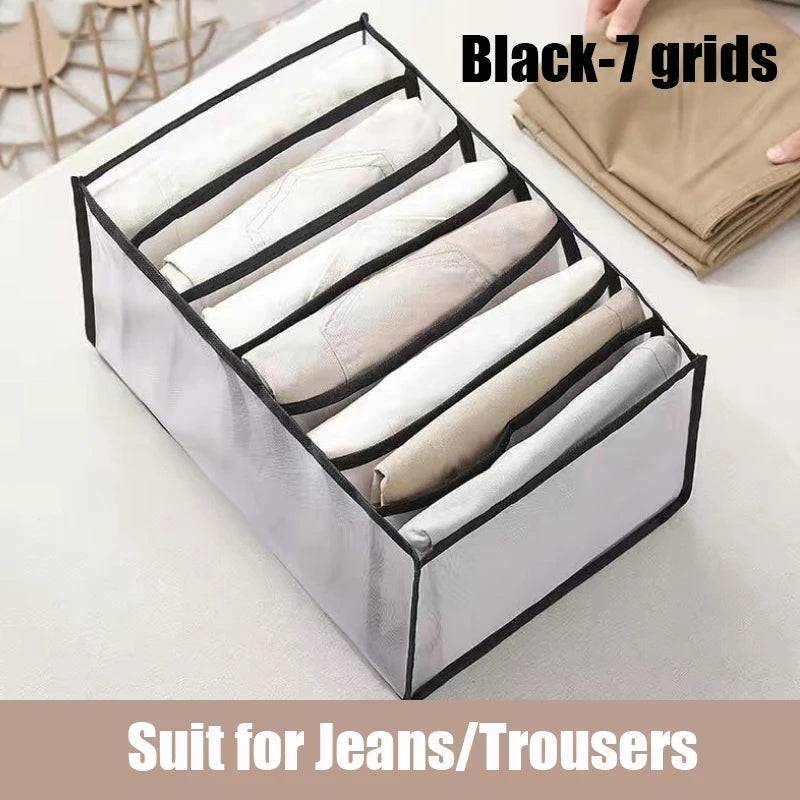 Black 7-grid drawer storage box for jeans and trousers, ideal for maximizing dresser space and organizing folded clothing neatly.