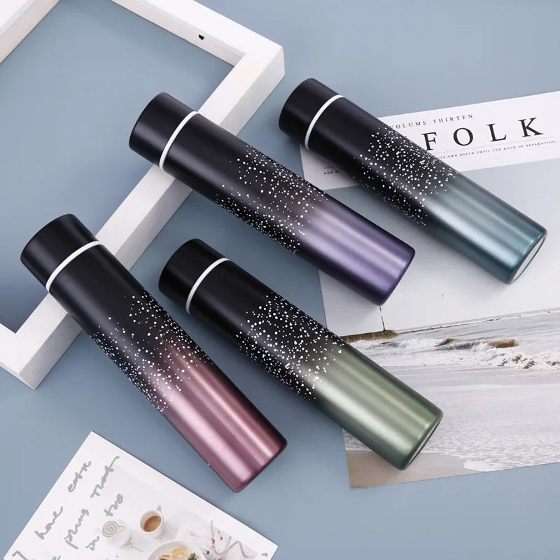 Mini Vacuum Flask 310 ml in gradient colors with star pattern design, ideal for hot and cold drinks, available at Bamagate.com