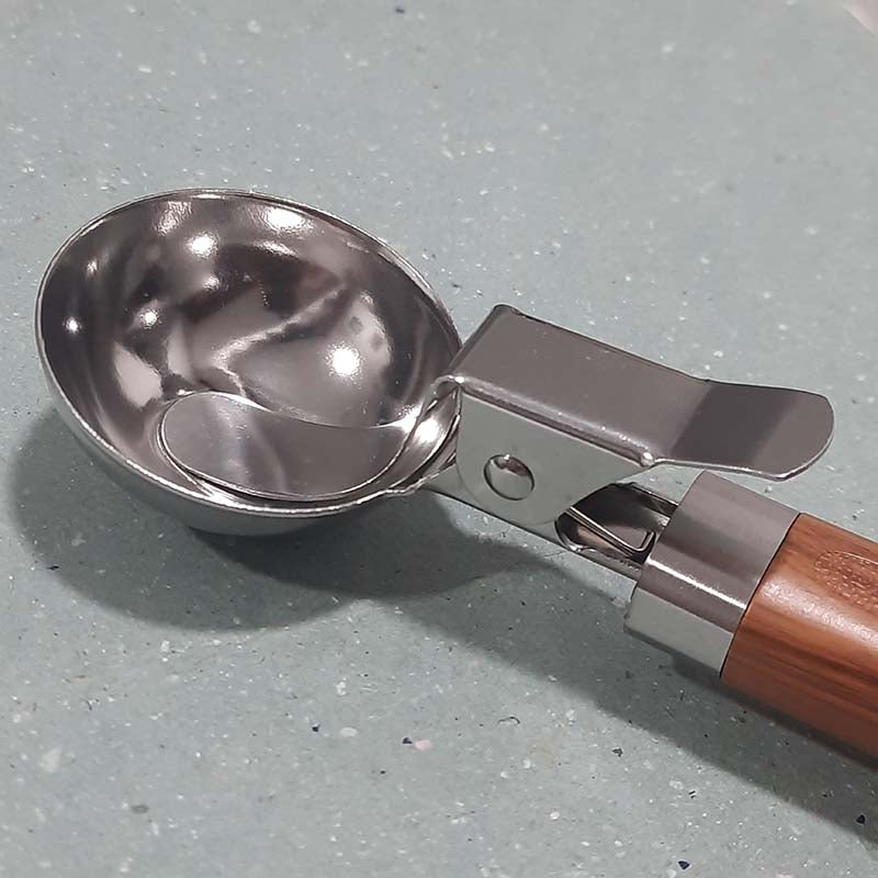 Close-up of Ice Cream Scoop with Trigger showing durable stainless steel scoop and trigger mechanism, ideal for kitchen and dining use.