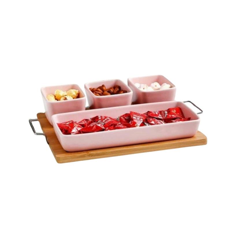 Ceramic serving plate price features a wooden tray with four pink ceramic bowls for nuts, candies, and snacks, great for home entertaining.