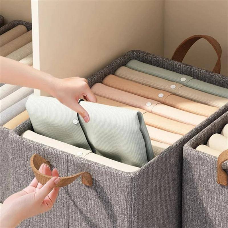 Nonwoven fabric Wardrobe Cloth Storage Organiser with leather handles, ideal for organizing folded shirts in a closet shelf.