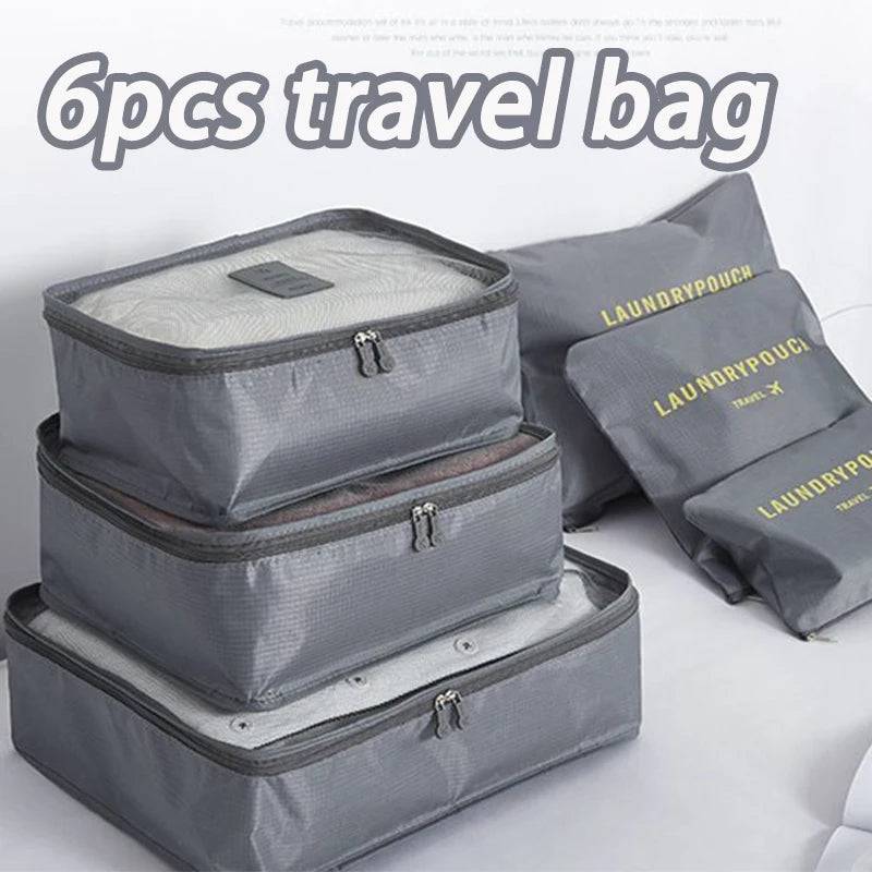 Travel Bag Set - 6PCS Storage Bags in gray with mesh tops and labeled laundry pouches, ideal for organizing clothes in luggage.
