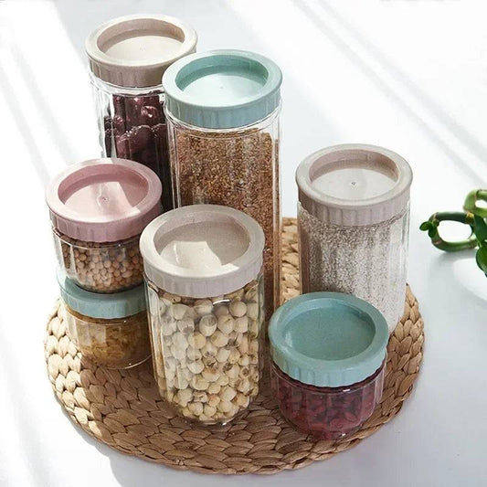 Stackable Plastic Storage Bottle set in various sizes filled with grains and legumes, ideal for kitchen storage and food organization.