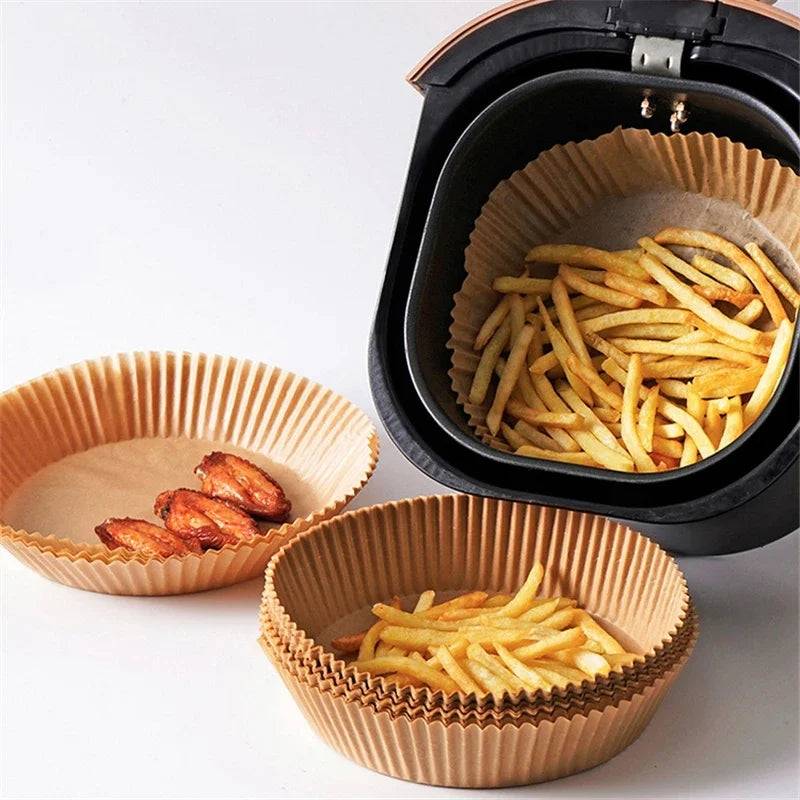 Air Fryer Paper liners used for fries and meat, perfect disposable tableware for clean and efficient air frying, available at Bamagate.com.