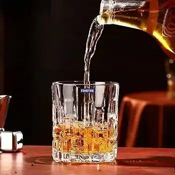 Whiskey being poured into a Brick Whisky Glass from the 6PCs Set for Gift Price in Sri Lanka, highlighting elegant design and clarity.