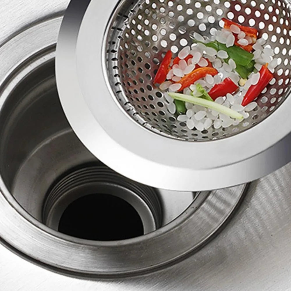 High-quality Stainless Steel Kitchen Sink Strainer Stopper catching vegetable scraps in a modern sink, perfect for clog prevention and hygiene.