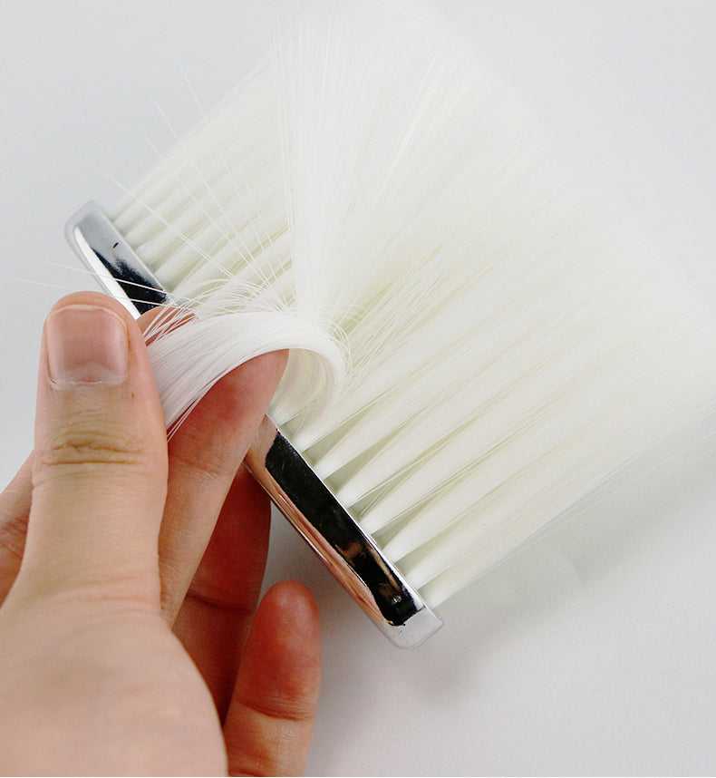 Close-up of white bristle Neck Duster Brush for Hair Cleaning, showing ultra-soft texture for gentle face and neck grooming in salons.