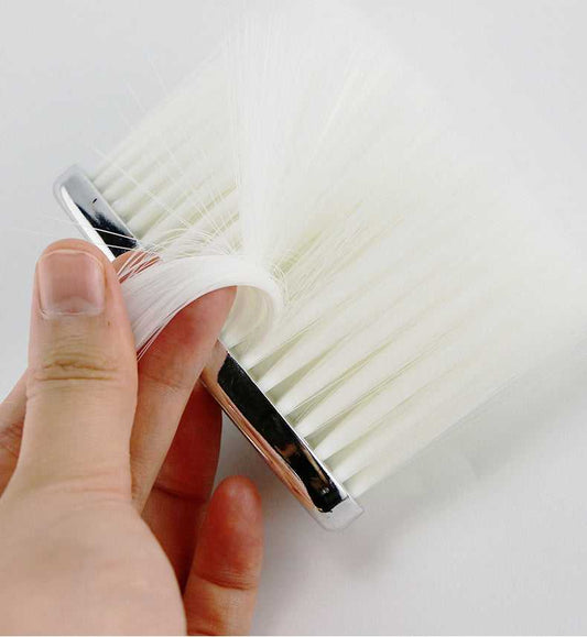Close-up of white bristle Neck Duster Brush for Hair Cleaning, showing ultra-soft texture for gentle face and neck grooming in salons.