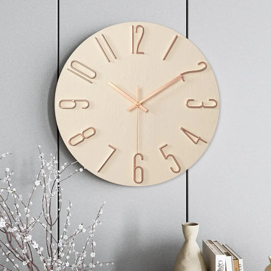 Round wall clock with silent non-ticking movement and minimalist design, mounted on a modern grey wall, ideal for quiet home decor.