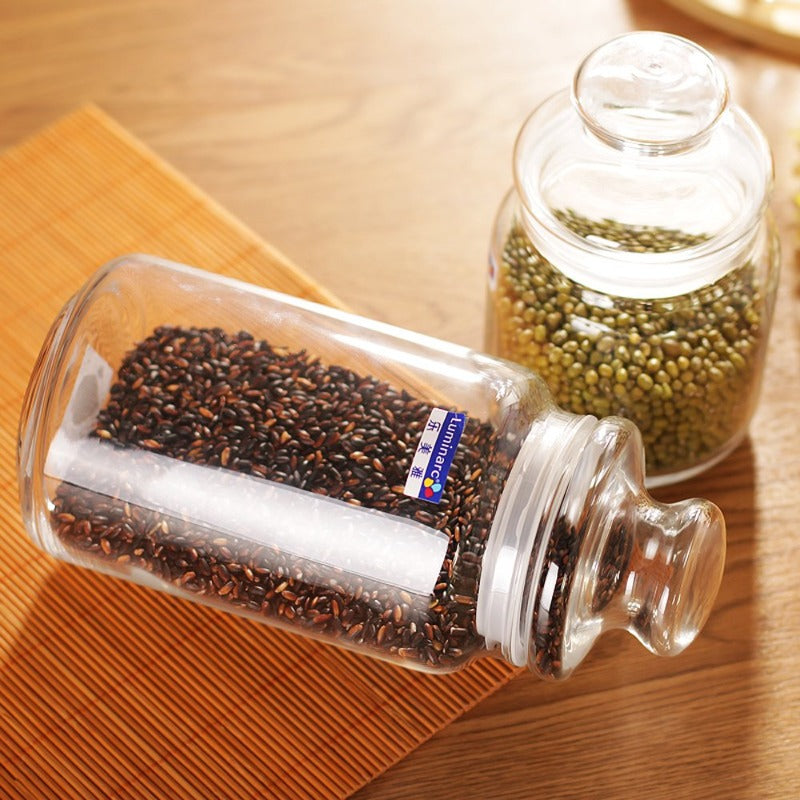 Luminarc airtight glass bottles storing grains and seeds on a wooden surface, perfect for kitchen storage from Bamagate.com in Sri Lanka