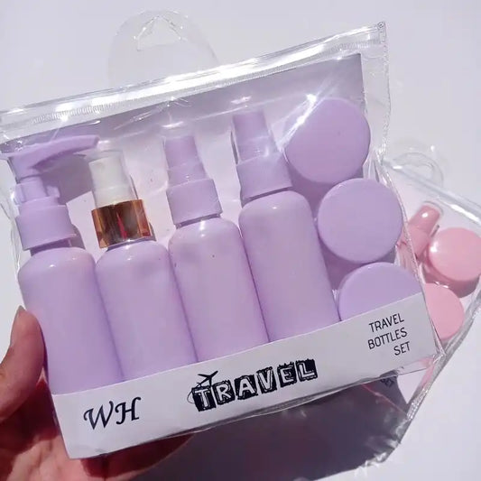 6PCS Mini Travel Refill Bottles in pastel purple, including pump, spray, and cream containers, ideal for travel kits and makeup tools.