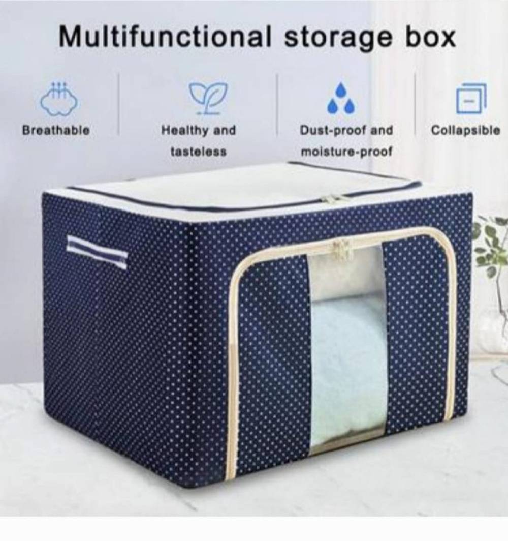 Navy blue Foldable Cloth Storage Box 39cm with polka dots, breathable and dust-proof, perfect for storing clothes and household items.