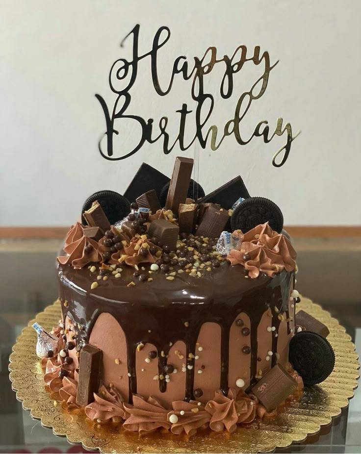 Choco Dipping Cake 1kg - Birthday Delight topped with chocolate bars, Oreos, and ganache drip. Ideal for birthdays and chocolate lovers.