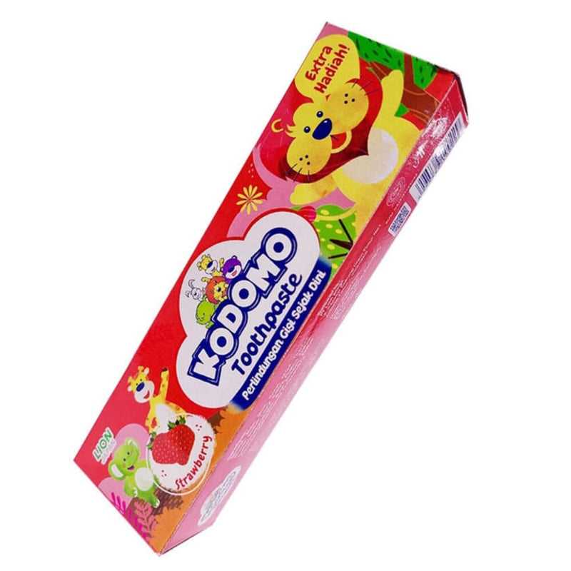Strawberry-flavored Kodomo baby toothpaste with cartoon lion design, perfect for children's oral care. Shop toothpaste for babies at Bamagate.com.