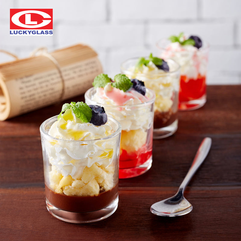 6 PCS Classic Shot Glass Set 60 ml filled with layered desserts, showcasing clear glass design and heavy base for stylish serving.