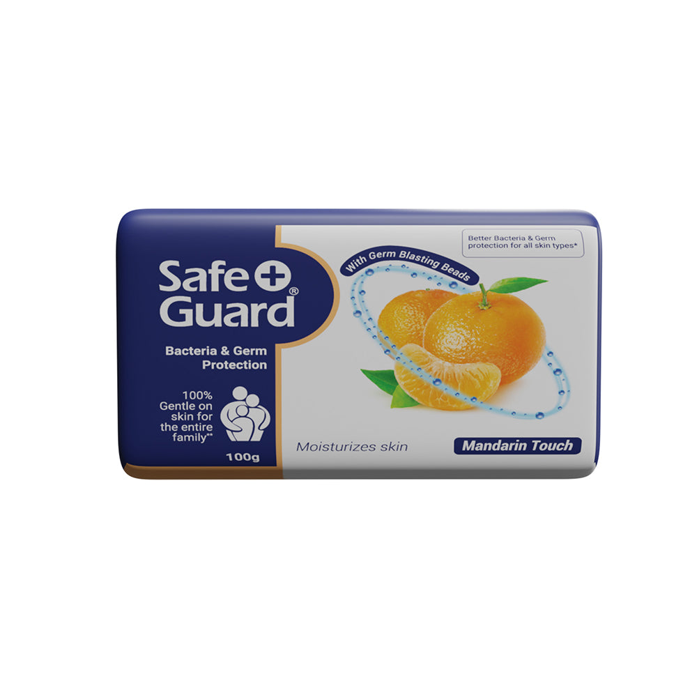 Safeguard Anti Bacterial Soap Mandarin 100g bar with citrus design, offers 99.9% germ protection and skin moisturizing benefits.