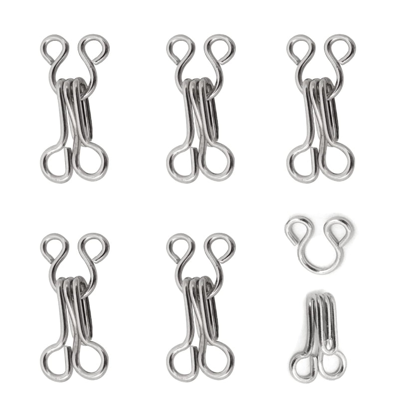 20 pairs silver sewing hooks and eye closures for garments. Durable fasteners ideal for tailoring, crafts, and custom clothing projects.