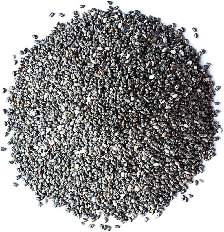 Close-up of Kpon Chia Seeds 100g Rich in Nutrition showing a pile of nutrient-rich black chia seeds for healthy cooking and baking.
