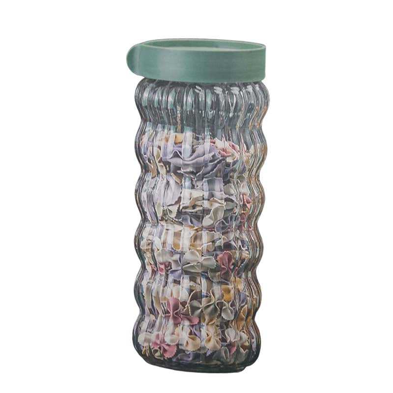 900ml wavy glass storage bottle with airtight green lid, part of the 9 PCS kitchen storage set for dry food from Bamagate.com.