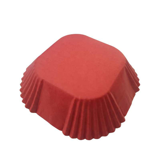 Red grease-proof brownie liner with fluted edges from the 25 PCs Set, ideal for baking square-shaped cupcakes or brownies.