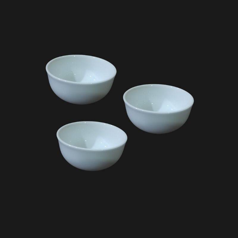 Set of three 4.5 inch white ceramic ice cream bowls with a smooth glossy finish, ideal for serving desserts in modern kitchen and dining settings.