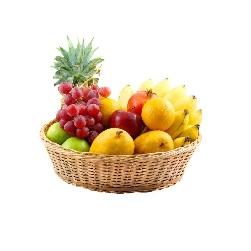 Reusable cane fruit basket filled with assorted fresh fruits, perfect for eco-conscious food storage in home kitchens or dining areas.