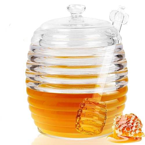 Glass Honey Jar with Dipper 236 ml from Bamagate.com, featuring a clear ribbed design and dipper, perfect for honey storage and serving.