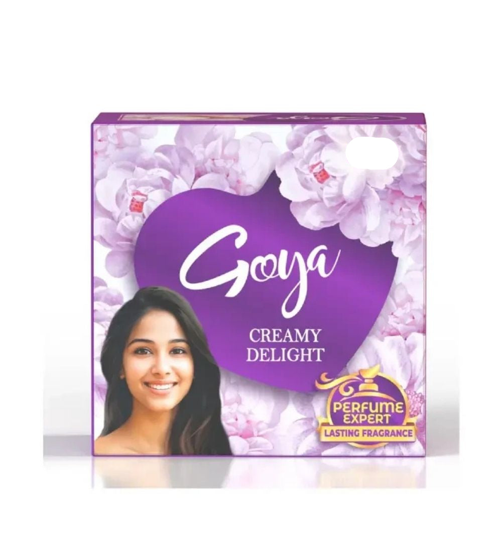 Goya Soap Creamy Delight 80g bar soap with floral packaging and a smiling woman, ideal for skin care and moisture retention in Sri Lanka.