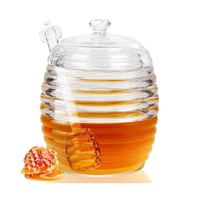 Buy Glass Honey Jar with Dipper | Bamagate.com Online – 236 ml beehive-shaped glass jar filled with honey, includes a matching glass dipper.
