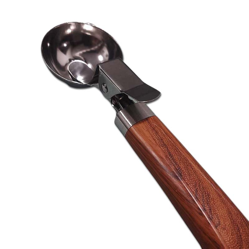Ice Cream Scoop with Trigger featuring a polished stainless steel head and ergonomic wooden handle for easy dessert serving in any kitchen.