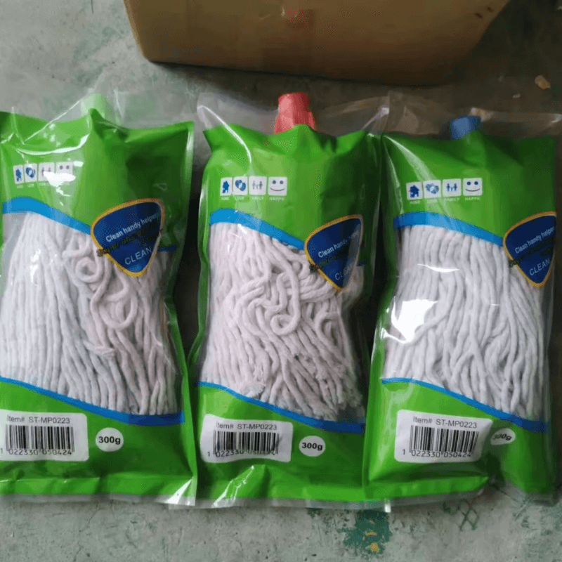 Individually packaged cotton thread mop head replacements, 300g each, with colored caps for easy identification and efficient cleaning.