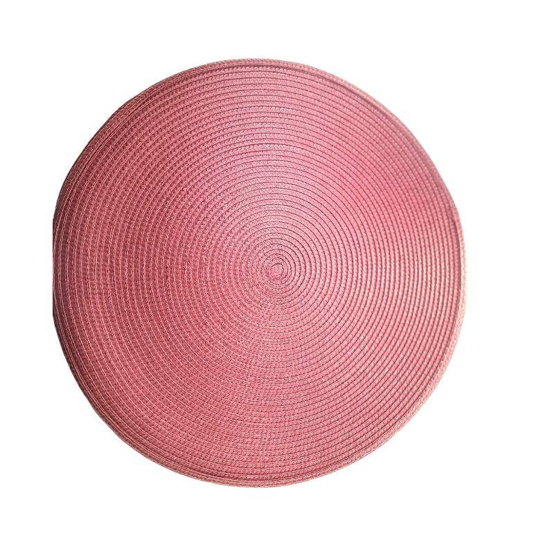 Single 38cm maroon round PVC table placemat with textured spiral design, ideal for protecting dining surfaces in stylish home settings.