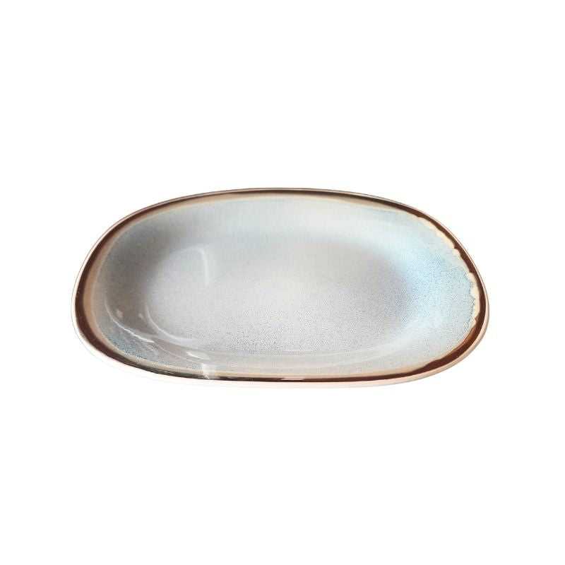 Elegant 12 inch Nordic porcelain serving plate with soft gradient finish and organic shape, perfect for stylish table presentations.
