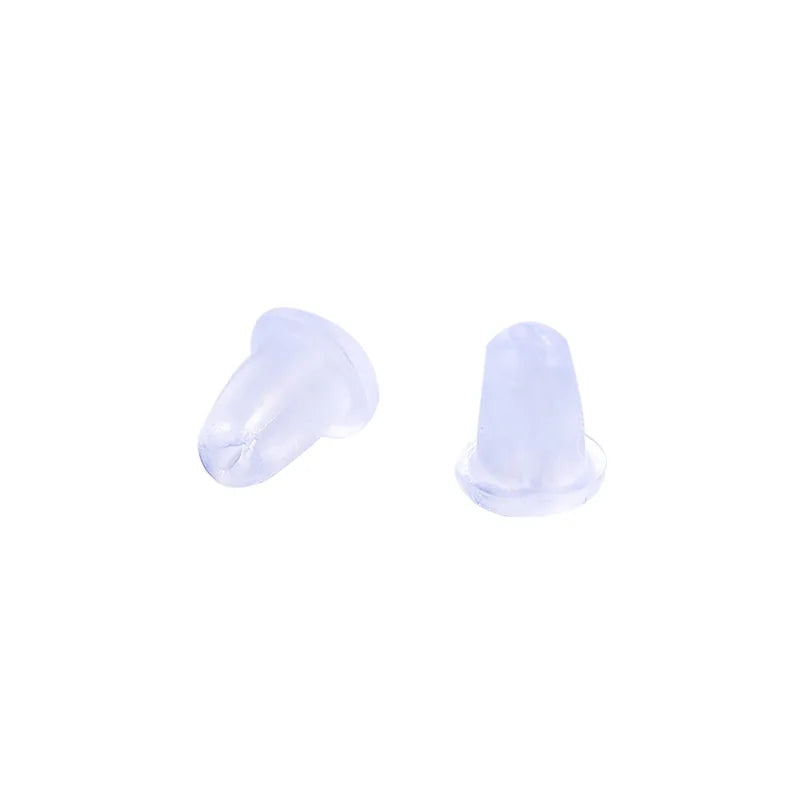 Close-up of two transparent silicone earring stoppers designed for comfort and secure fit in jewelry crafting.