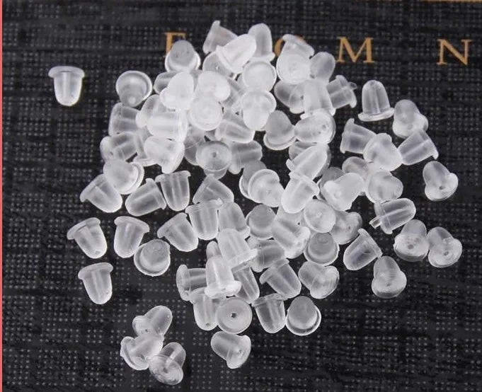 Bulk pack of clear silicone earring clasps for secure jewelry fastening, ideal for crafting and daily wear in Sri Lanka.
