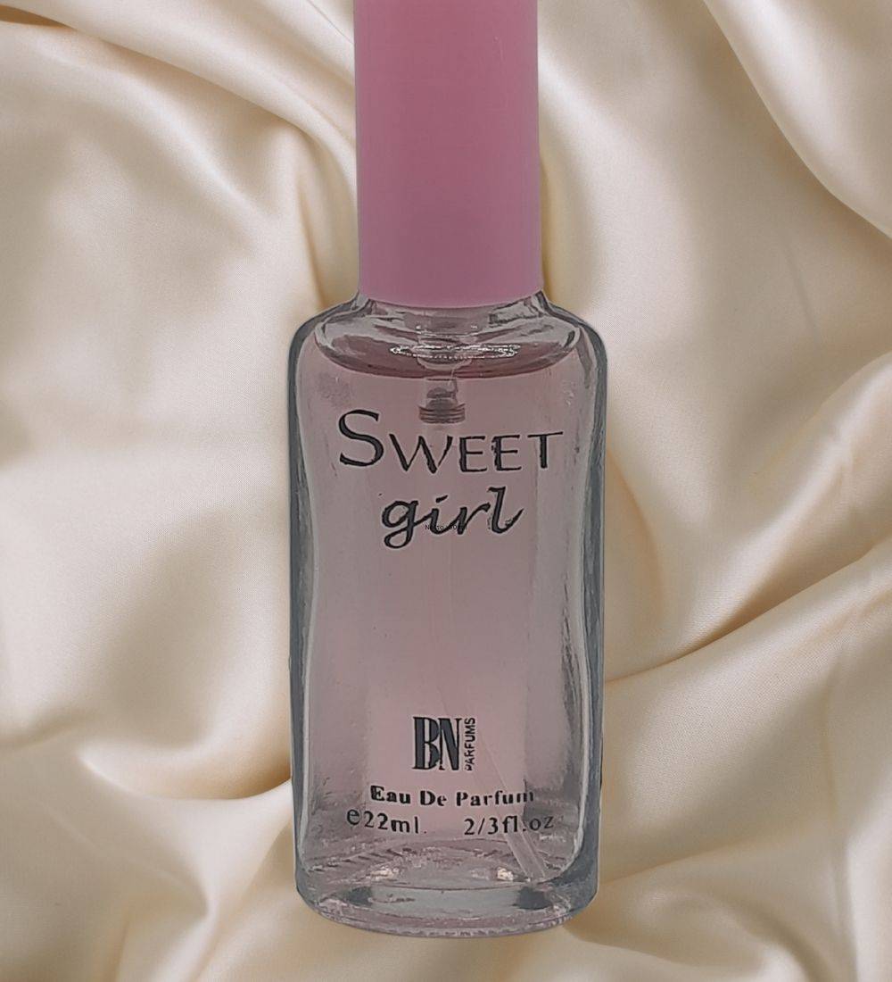 Sweet Girl Perfume 22ml for Women displayed on satin fabric, showcasing its elegant design and feminine fragrance appeal.