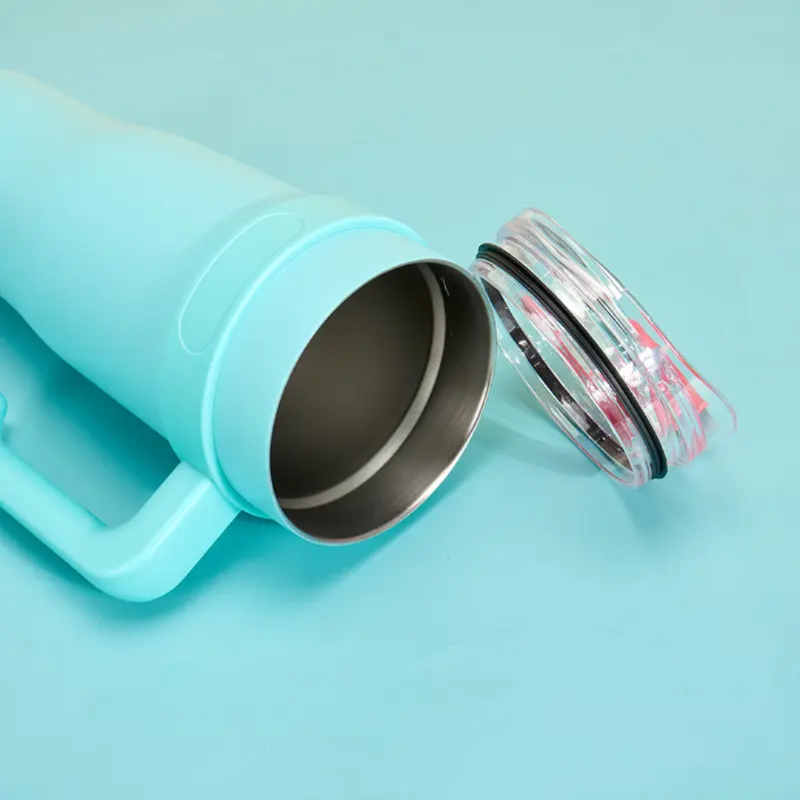 Turquoise water bottle with a clear lid  1200 ml