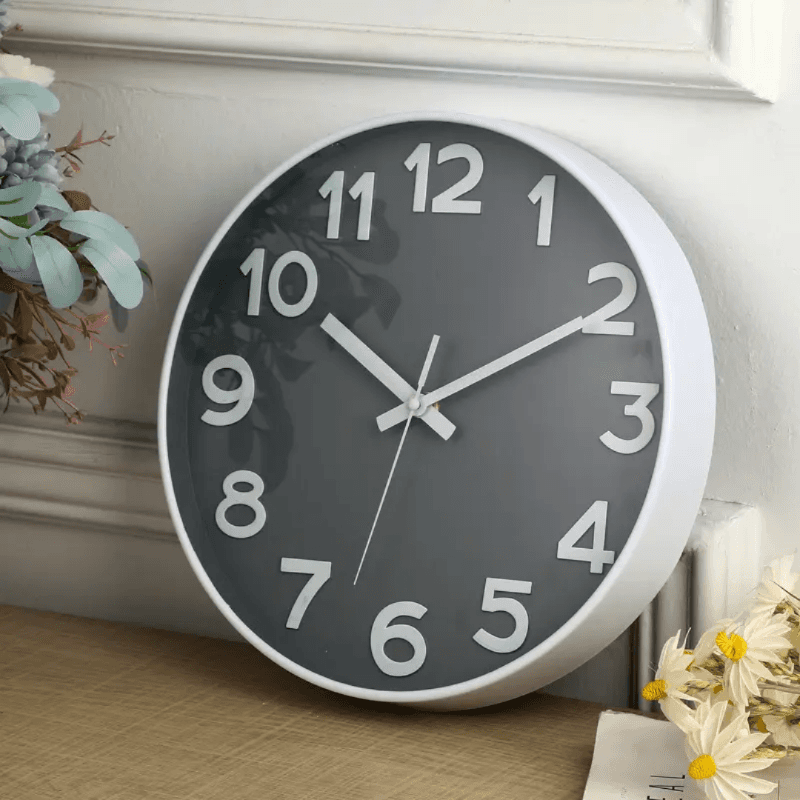 wall clocks pays homage to classic vintage style with black background.