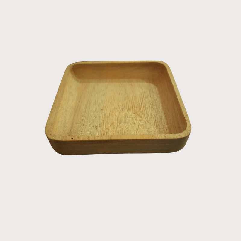 Small square wooden serving tray with smooth edges, perfect for eco-friendly kitchen and dining applications.