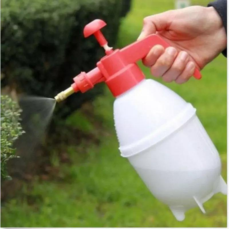 Handheld 1L garden sprayer in use, spraying plants in a lawn setting. Shop garden spray pressure bottle for home gardening at best price in Sri Lanka.
