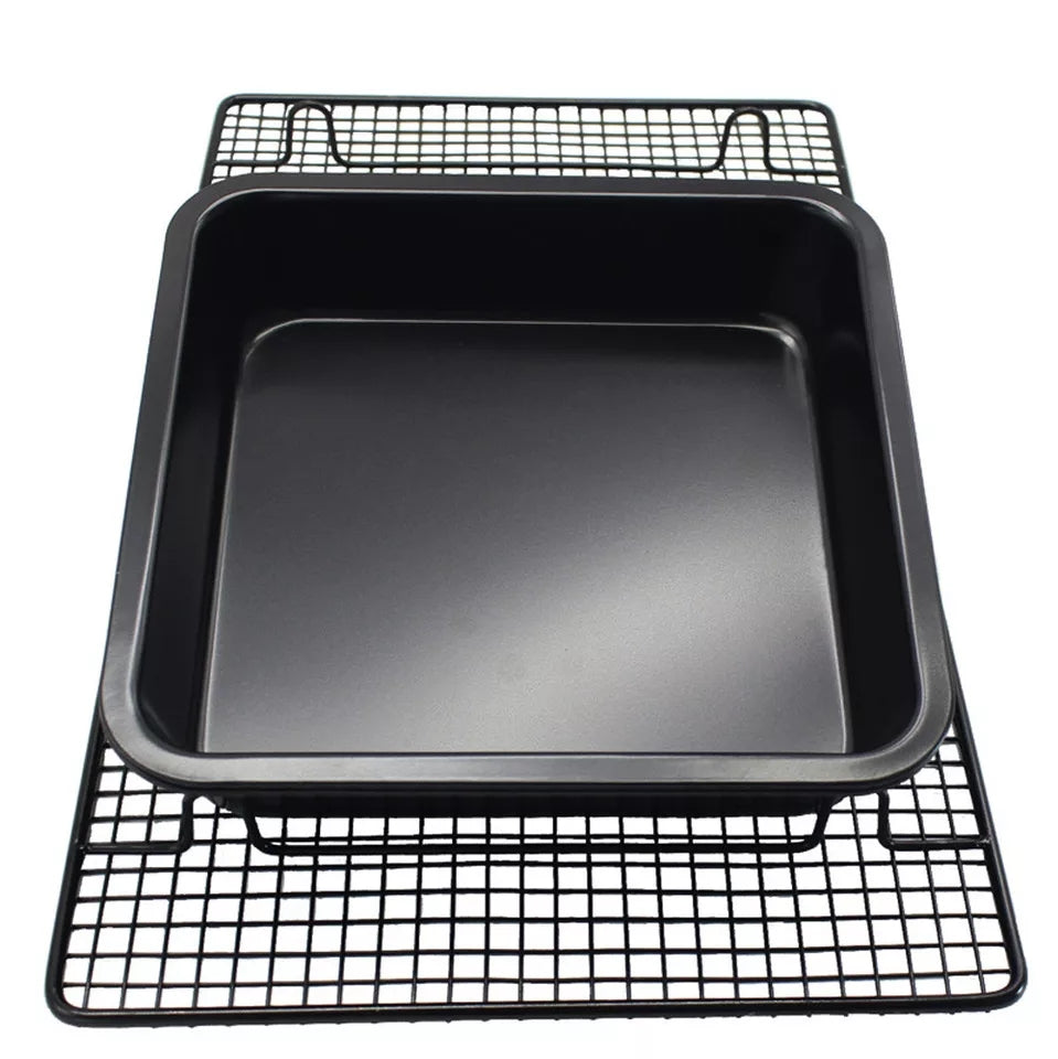 23cm square cake tray with nonstick coating placed on a cooling rack, designed for easy cake release and quick cooling.