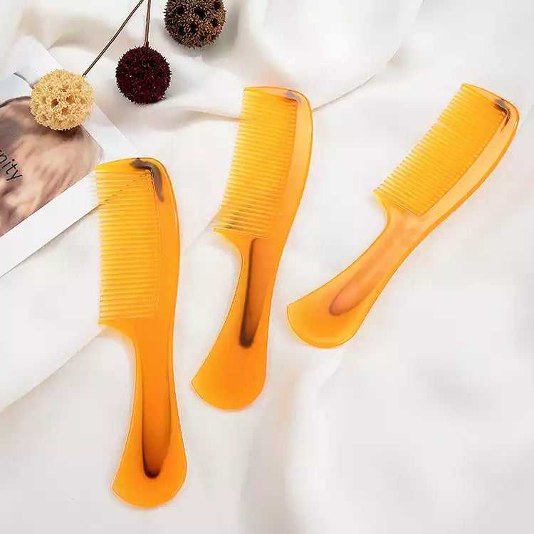Set of three Hair Comb Long Handle for Relaxing Scalp Massage with Jasmine on soft fabric. Perfect for daily hair styling and soothing scalp massage.