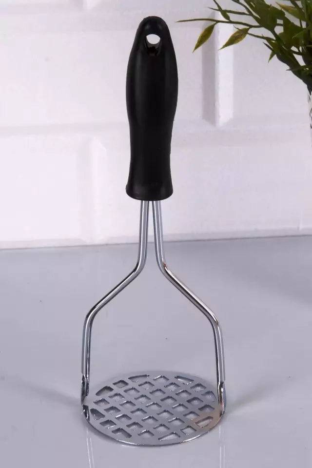 Classic stainless steel potato masher with black handle and grid-style mashing plate. Perfect kitchen utensil for smooth mashed potatoes in Sri Lanka.