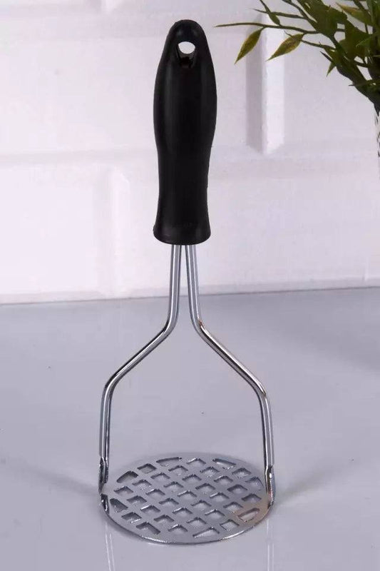 Classic stainless steel potato masher with black handle and grid-style mashing plate. Perfect kitchen utensil for smooth mashed potatoes in Sri Lanka.