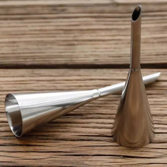 Stainless steel Cream Puff Nozzle Set displayed on wooden surface. Durable icing nozzles for professional and home baking needs.
