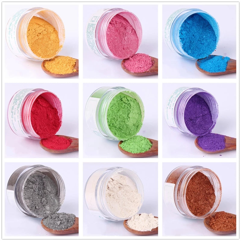 Assorted edible glitter powder for cake decorating in vibrant colors like red, blue, green, and gold. Shop Edible Dust Powder Price at Bamagate.com.