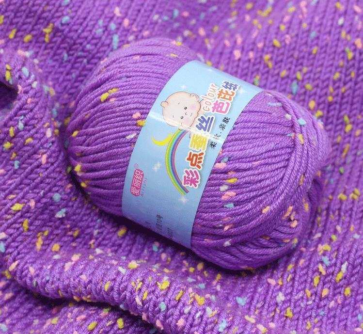 Purple cotton crochet yarn with multicolor speckles, ideal for knitting sweaters, scarves, and accessories. Self-striping 50g crochet wool yarn.