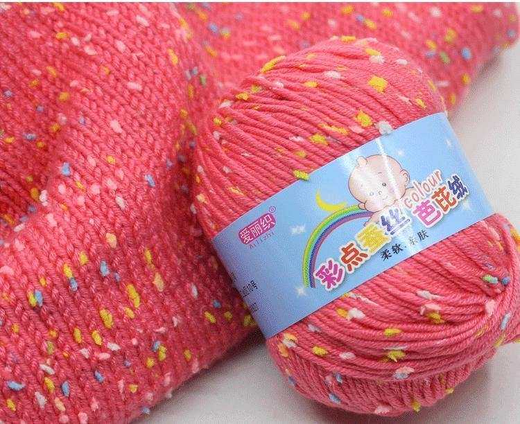 Pink cotton crochet yarn featuring multicolor speckles, great for handmade clothing and decor. Self-striping 50g crochet wool yarn skein.