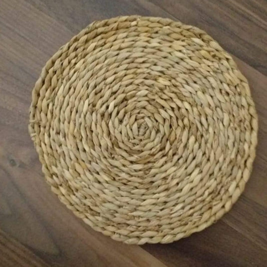 Eco-friendly Seagrass Woven Placemat in smaller 8-inch size, handmade reed table mat perfect for sustainable table settings.
