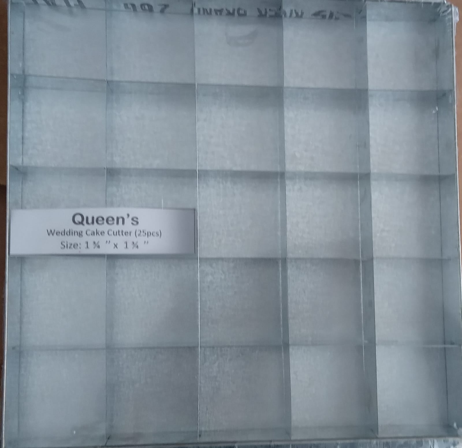 Queen’s Wedding Cake Cutter 24 PCS with 1.5 x 1.5 inch square grid, ideal for slicing uniform cake pieces. Buy online at Bamagate.com.